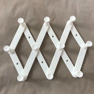 Vintage white Plastic Accordion Peg Hanger Made in USA